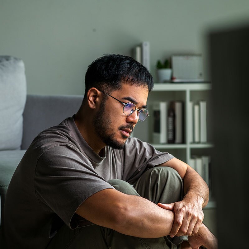 man struggling with thinking disorders
