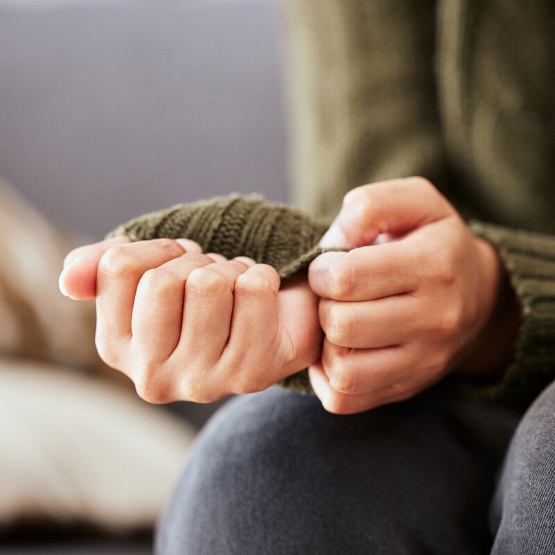 woman with phobias clenching her hands