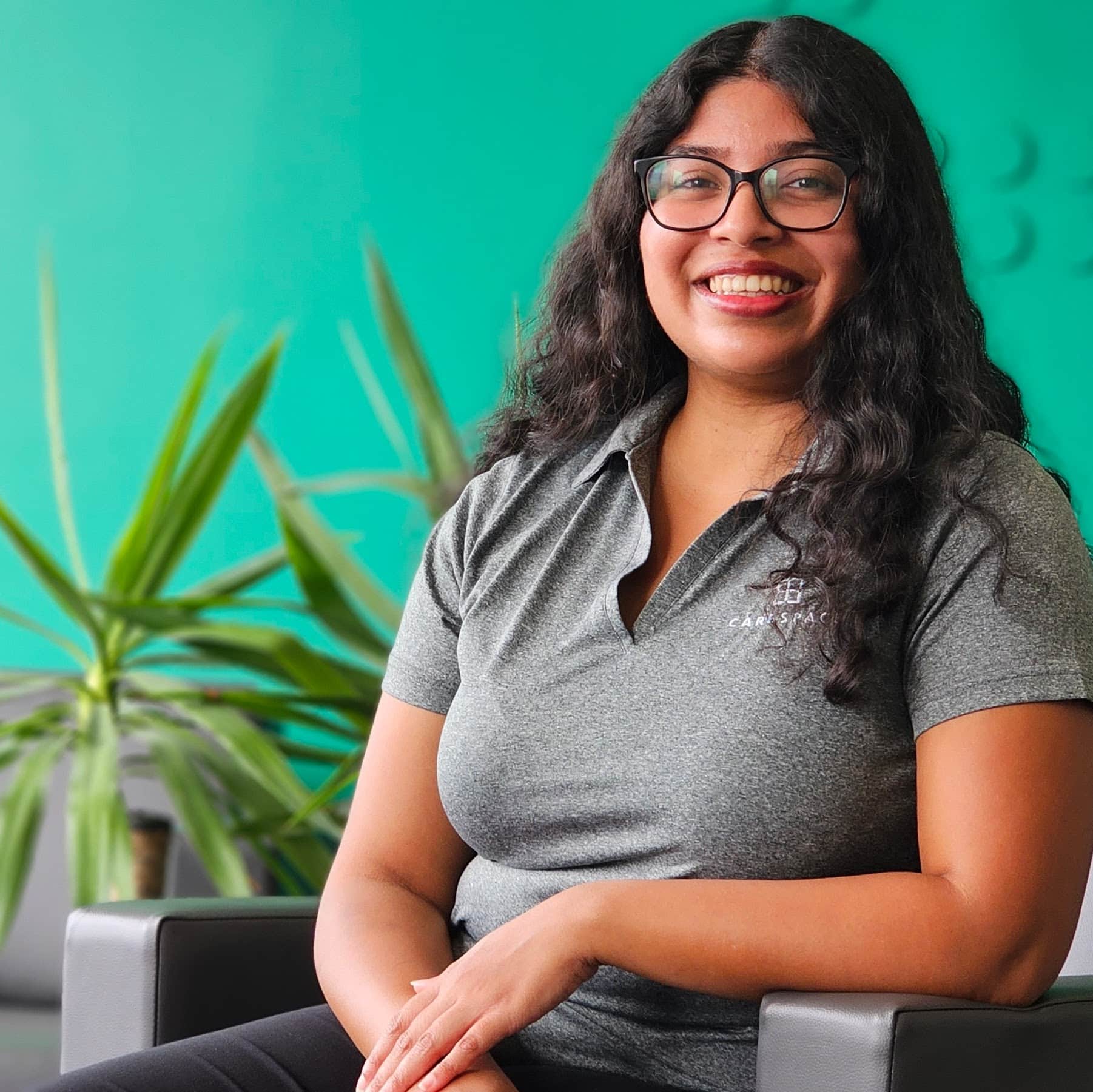 female Kitchener waterloo psychotherapist sitting in chair