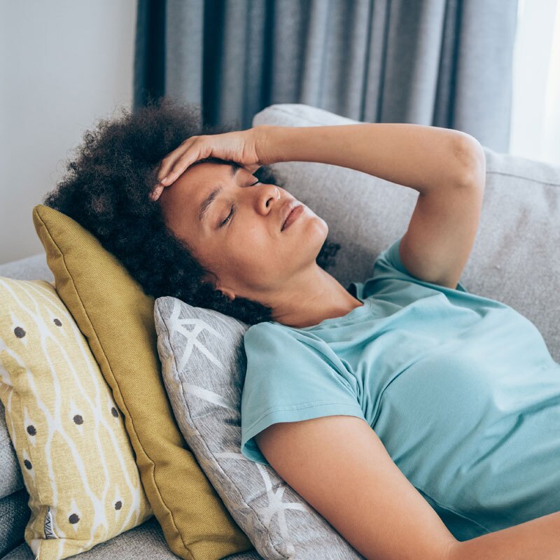 woman with pots lying down