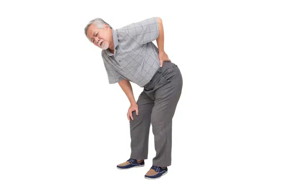 asian mature man feels back pain isolated white wall sad senior older man suffers from sciatica - Compression of the Sciatic Nerve: What You Need to Know
