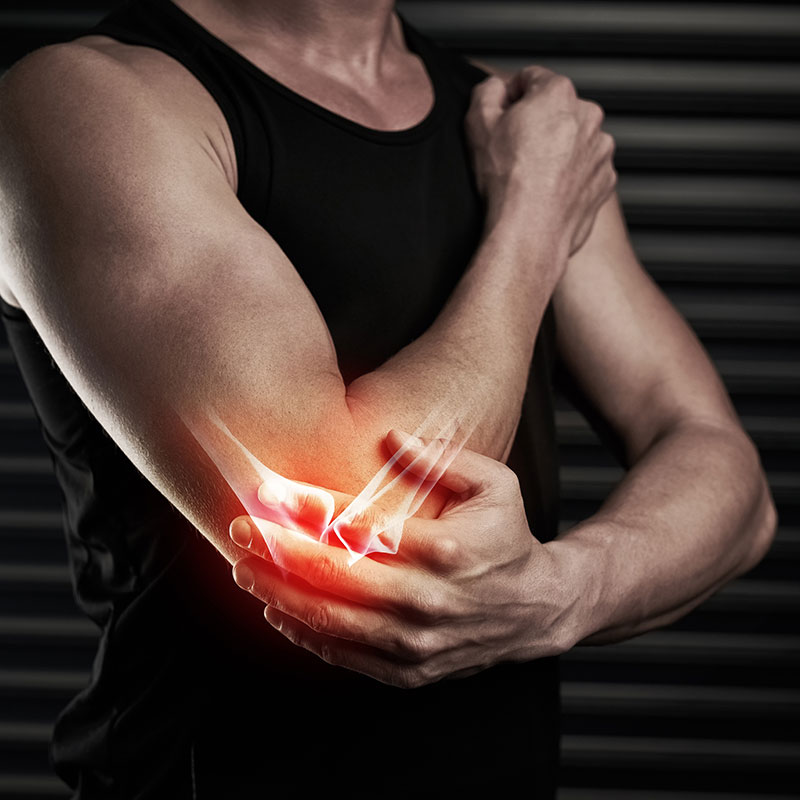 man with elbow pain